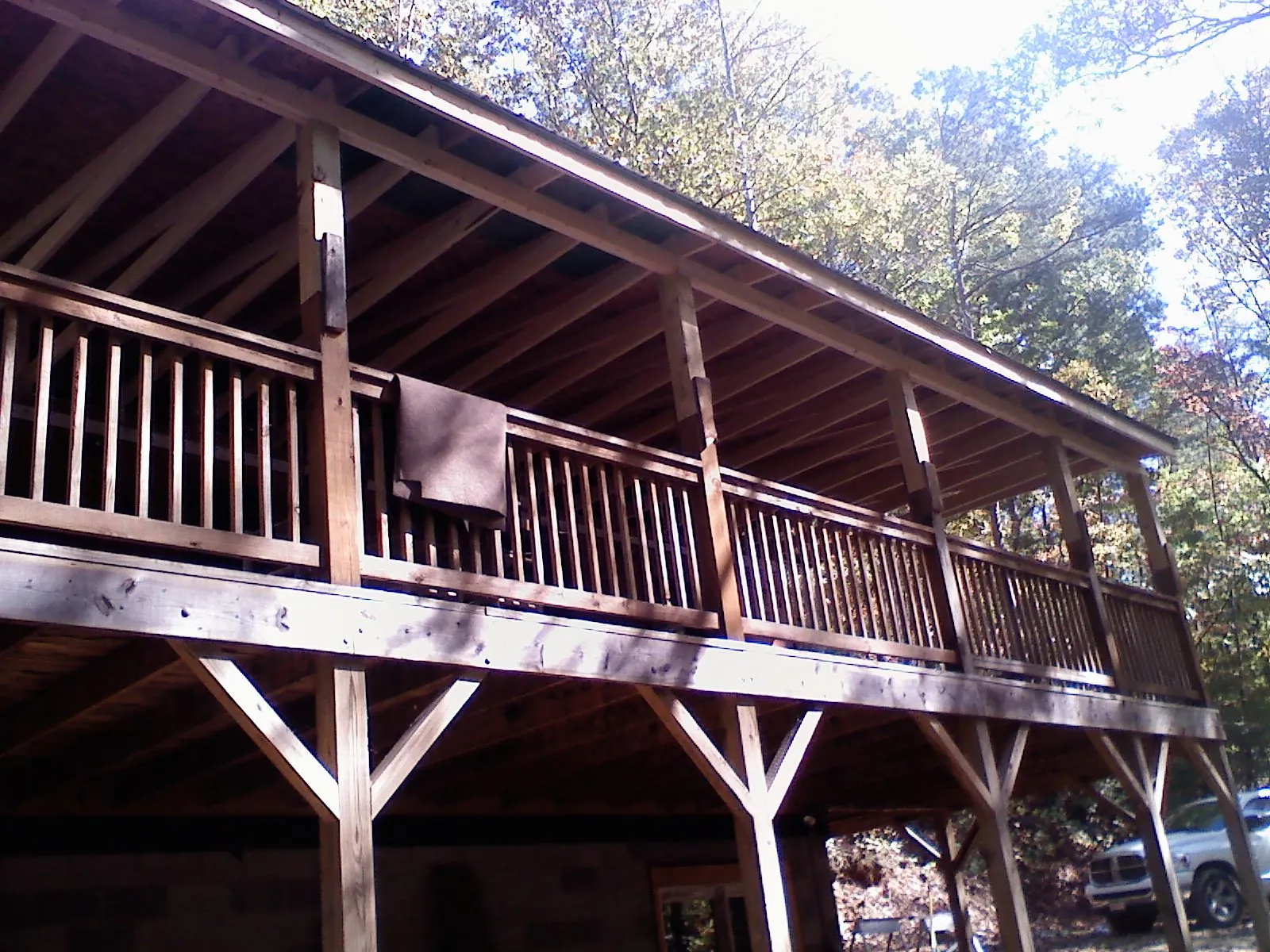 Timber framing under a new elevated porch and deck — Roof Leak Repair in Elrod by Roofing Brothers